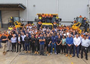 Carlos Sainz with the Komatsu Fairfield team and customers. Images: Komatsu.