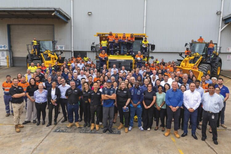 Carlos Sainz with the Komatsu Fairfield team and customers. Images: Komatsu.